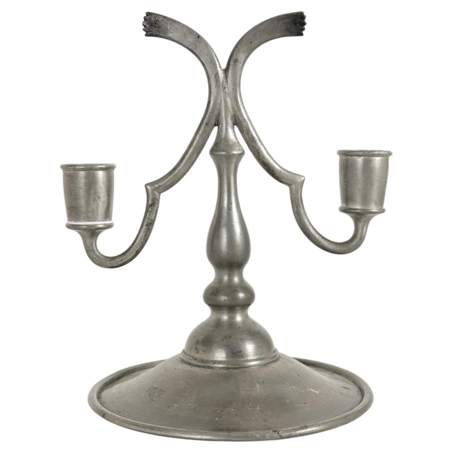 Candelabro in peltro modello 83 della ditta Svenskt Tenn, Svezia, 1925