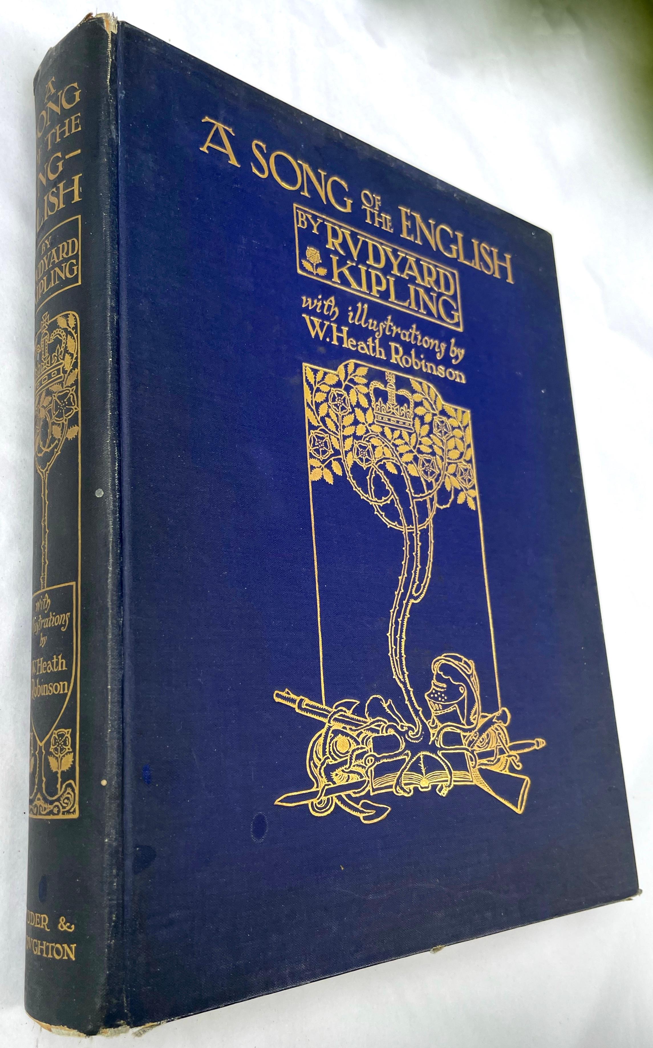 Première édition d'une chanson de The English de Rudyard Kipling. Toile bleue d'origine, avec des illustrations dorées sur le devant et le dos. Édition de l'ouvrage illustré de Robinson. Grand quarto (10 15/16 x 8 5/8 pouces). Trente planches en