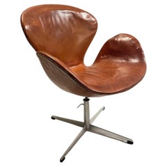 First Edition Arne Jacobsen Swan Chair, Original Patinated Leather, 1950s