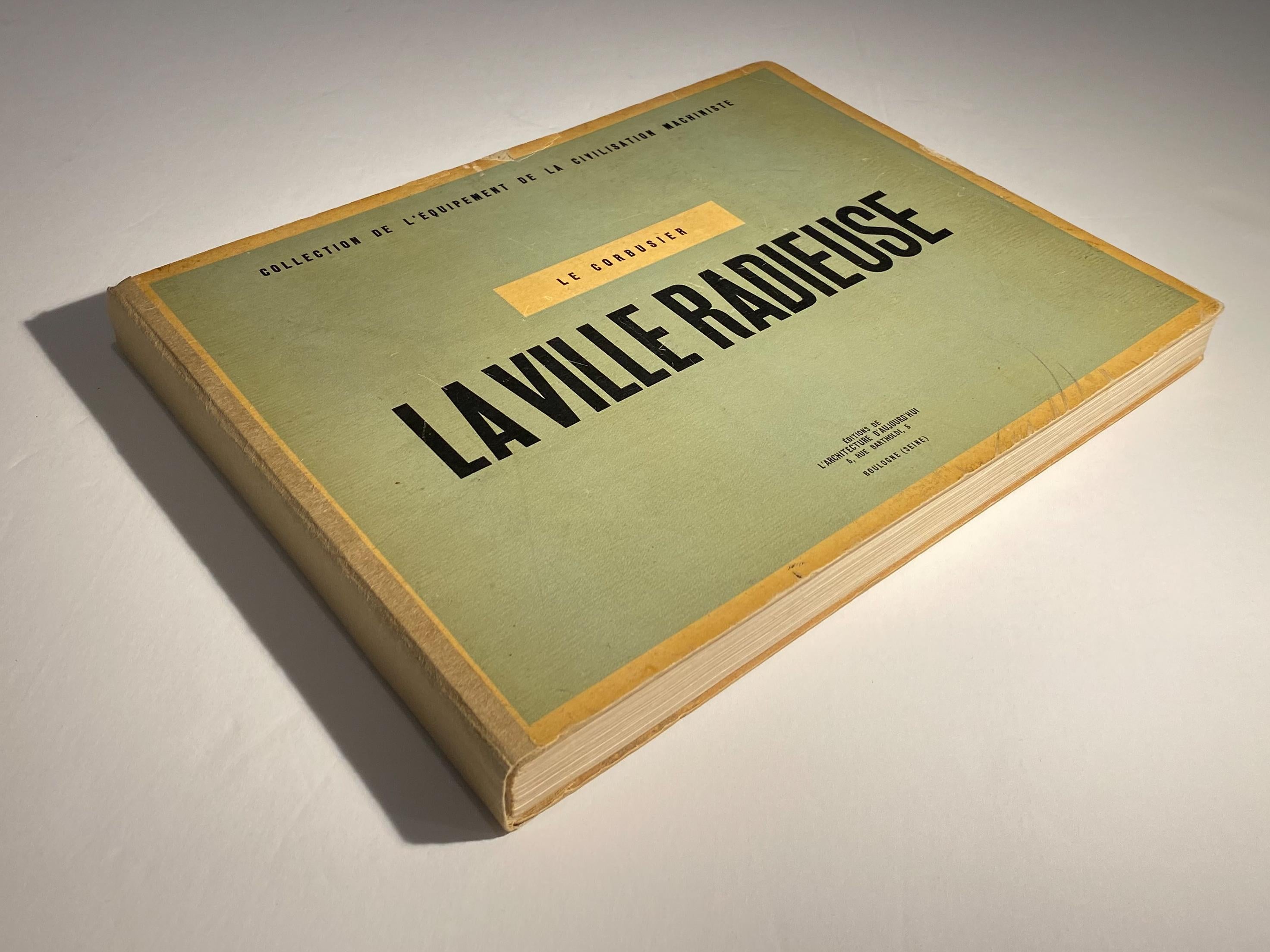 Hardcover first edition of Le Corbusier's seminal La Ville Radieuse (The Radiant City), published by the celebrated review L'Architecture D'Aujourd'hui. A rare volume, made more so by a warm full-page inscription in the year of publication (1935) by