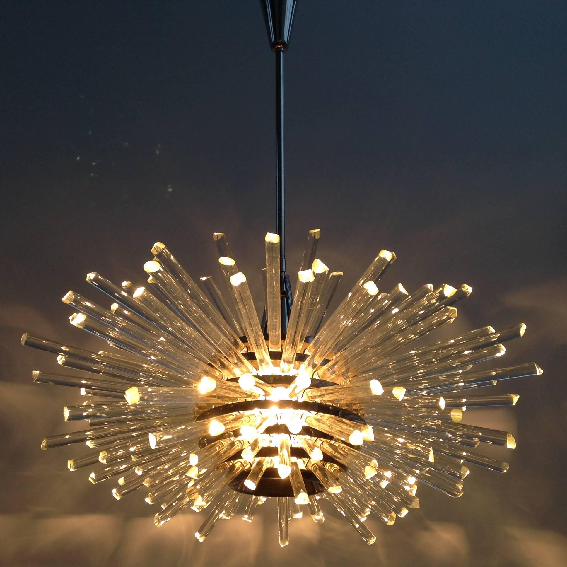 Beautiful Austrian midcentury chandelier model Miracle was designed by Prof. Friedl Bakalowits and made by his company Bakalowits & Söhne, Vienna, Austria in the 1960s. This first edition is the nickel-plated version, with clear crystal glass rods.