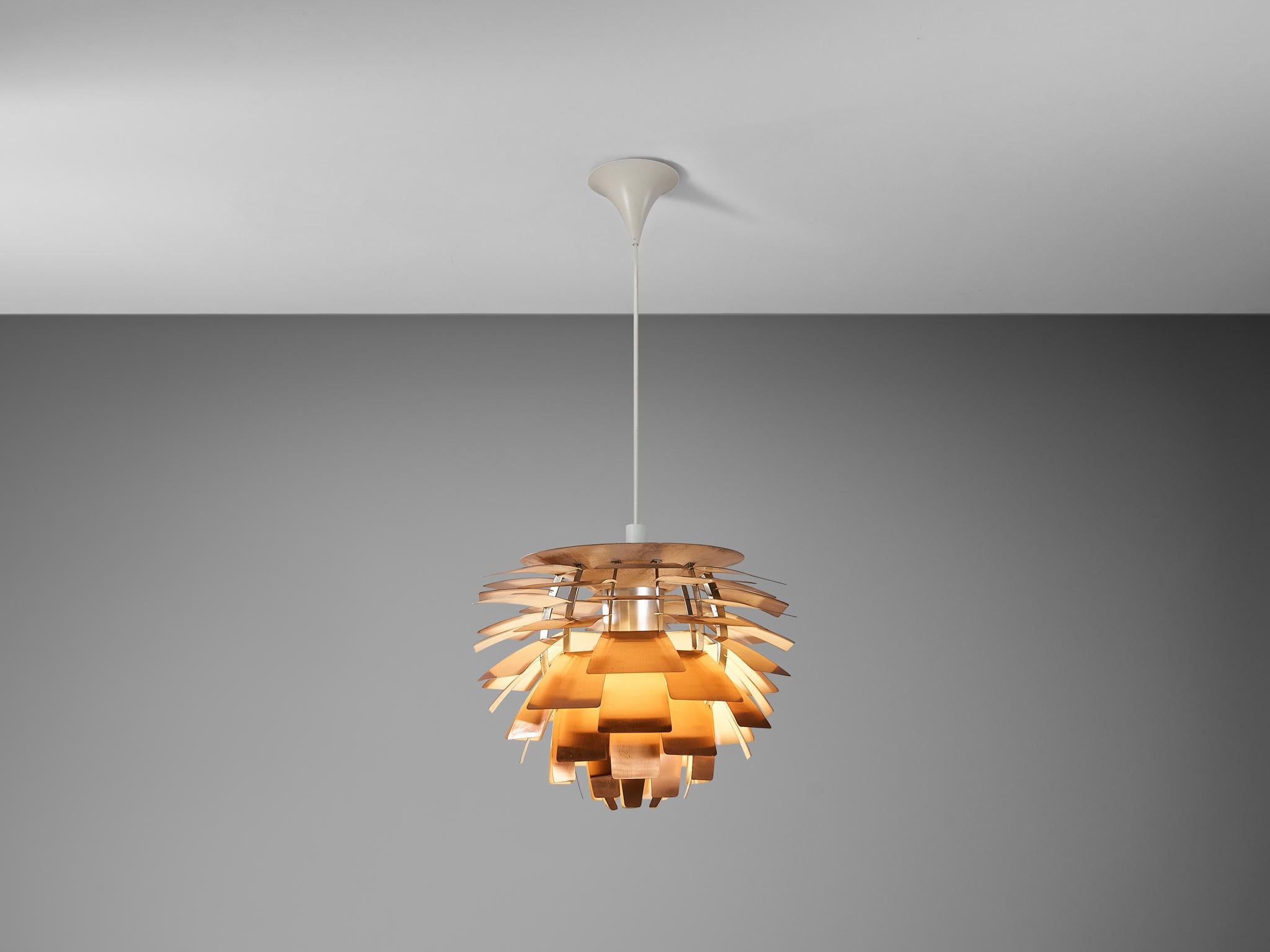 Poul Henningsen for Louis Poulsen, 'PH-Artichoke' pendant, patinated copper, design 1957, manufactured 1950s, Denmark. 

The 'Artichoke' pendant is an all time eyecatcher in the lighting design. This iconic pendant, designed by Poul Henningsen,