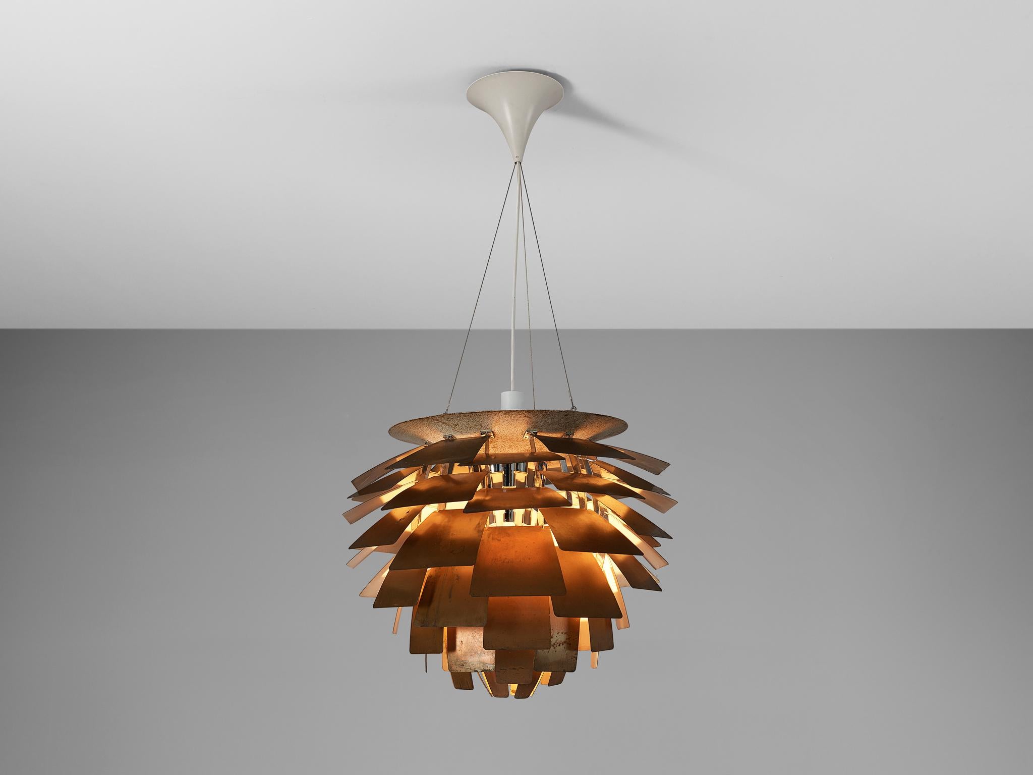 Poul Henningsen for Louis Poulsen, 'PH-Artichoke' pendant, patinated copper, design 1957, manufactured 1950s, Denmark. 

The 'Artichoke' pendant is an all time eyecatcher in the lighting design. This iconic pendant, designed by Poul Henningsen, has