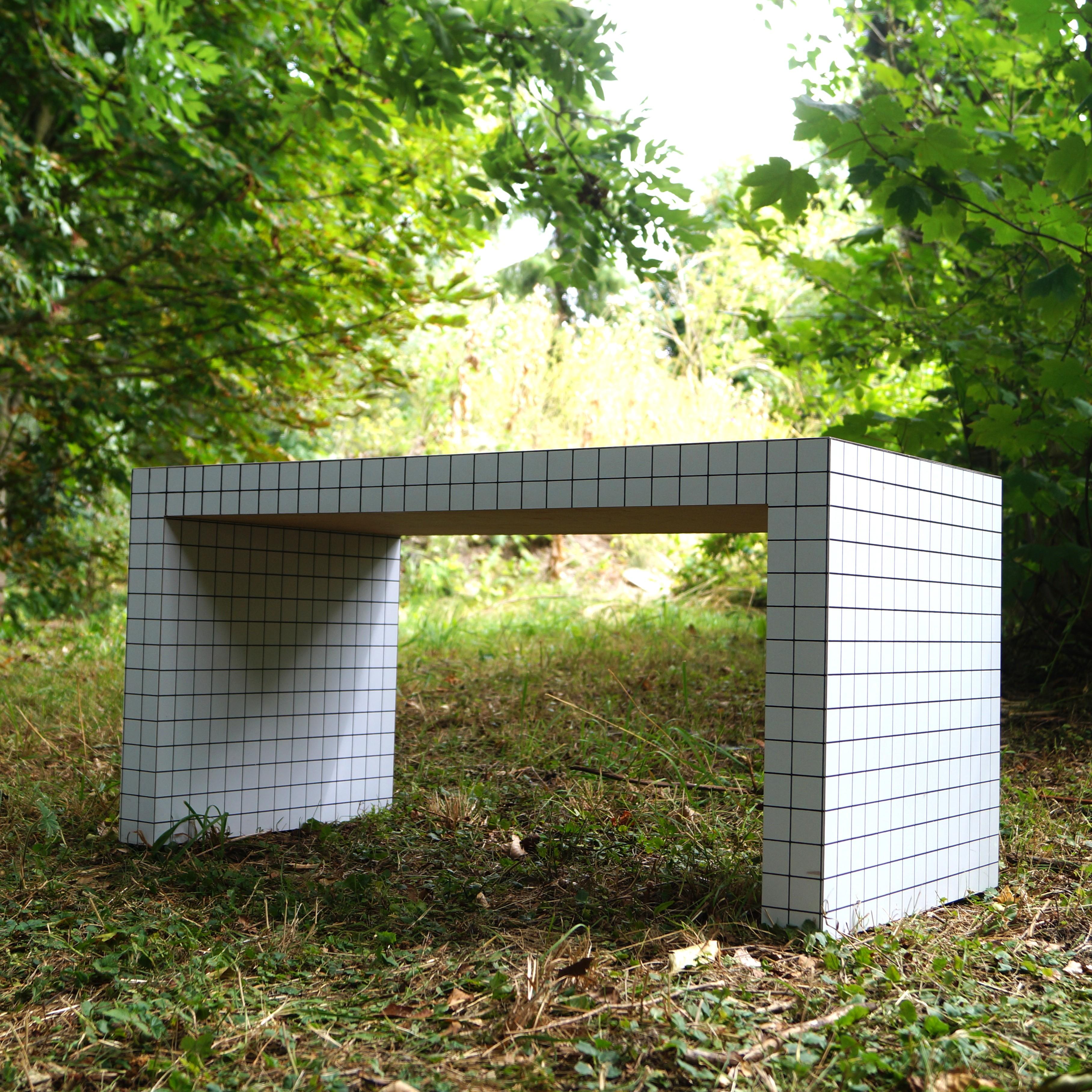 A ''Quaderna'' console table or bench by the iconic radical Superstudio collective, Italy. This piece is a 1st edition, before Zanotta started manufacturing in larger volumes. This table is a more rare design, it is documented and depicted on the