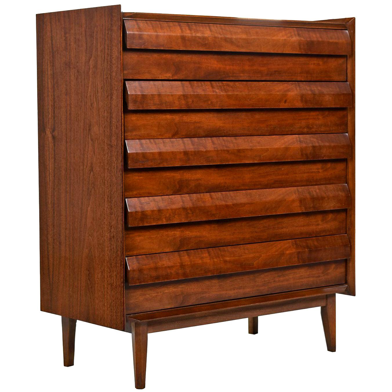 Stunning highboy dresser with louvered drawer fronts. This is a masterpiece of American, 20th century design, an absolutely beautiful example of Mid-Century Modern craftsmanship by Lane Furniture. Minimalist design with no hardware. Sharp, sleek and