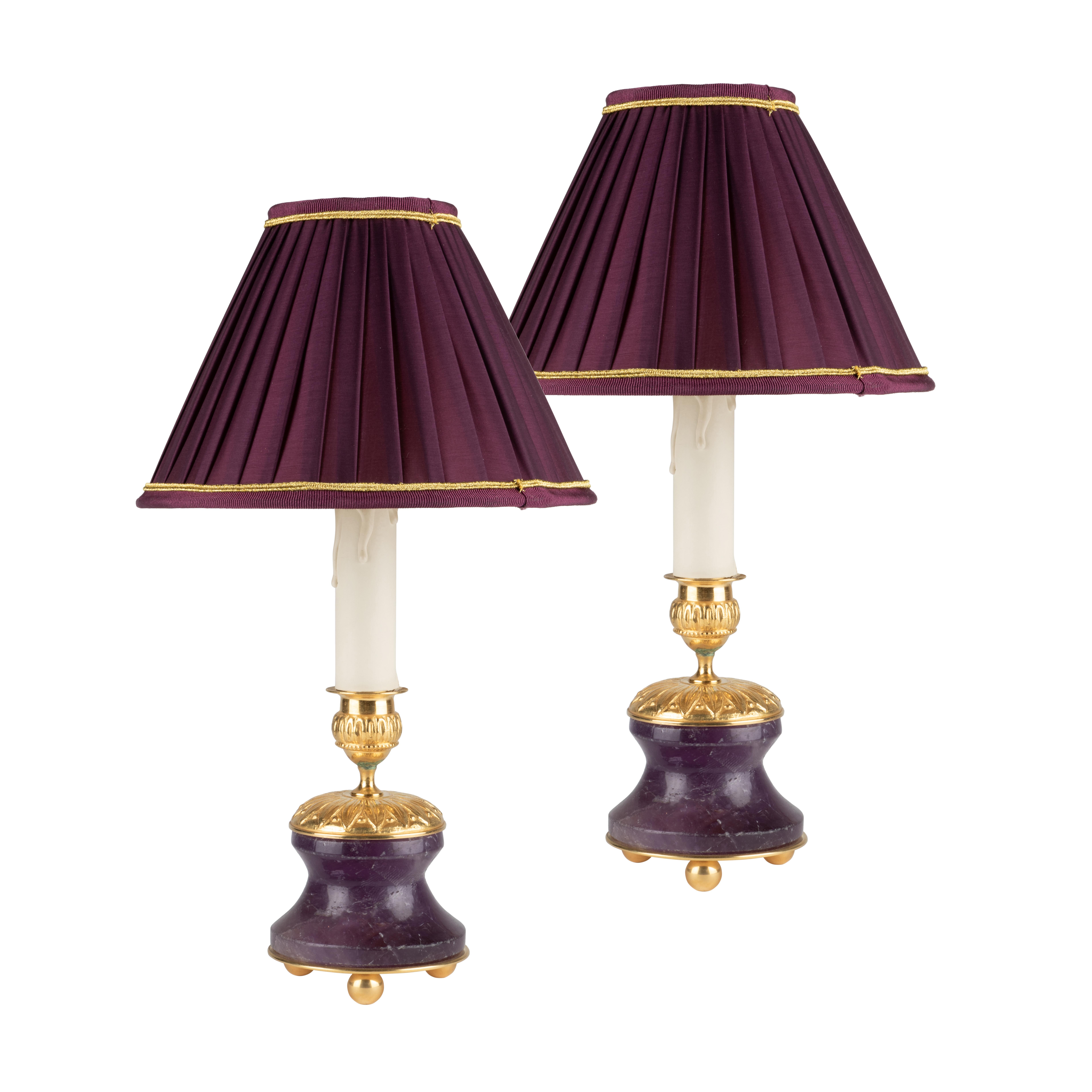 First Empire style pair in amethyst stone and 24 K ormolu gilding bronze .
Could be used as well as candlesticks .
Color of the lampshades could be customized by request.
Made in Paris.