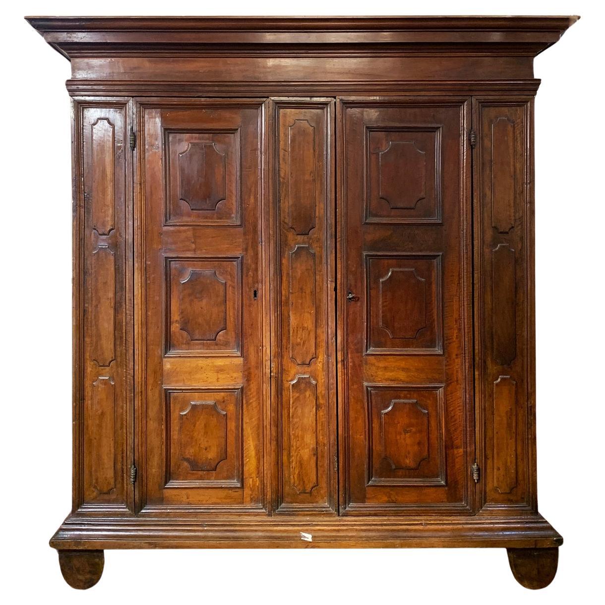 FIRST HALF OF THE 18th CENTURY LOUIS XIV SOLID WALNUT WARDROBE