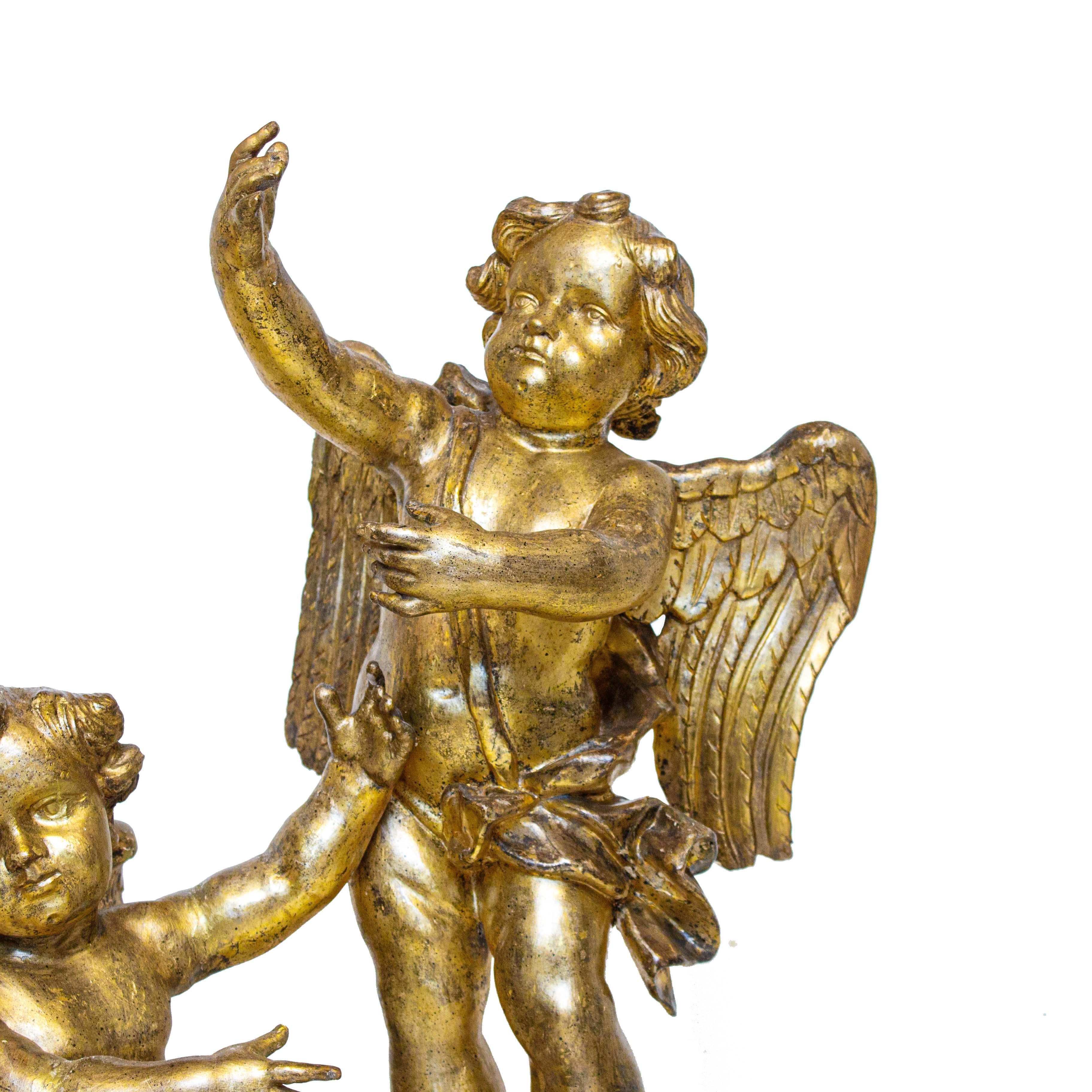 First Half of the 18th Century Putti Pair of Sculptures in Gilded Wood For Sale 11