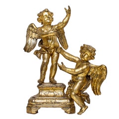 First Half of the 18th Century Putti Pair of Sculptures in Gilded Wood
