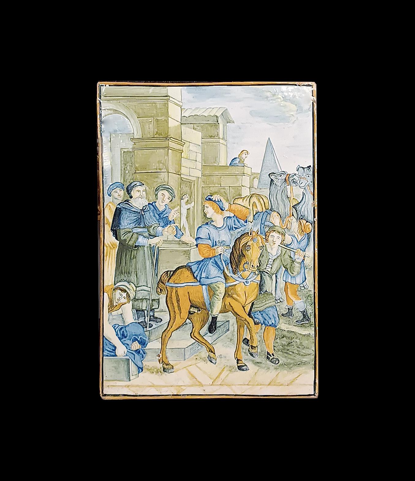 Belle plaque en majolique peinte verticalement, attribuable à la célèbre fabrique Castelli, située dans les Abruzzes (Italie centrale), datant de la première moitié du XVIIIe siècle. La plaque représente une scène inspirée de l'Évangile de Luc,