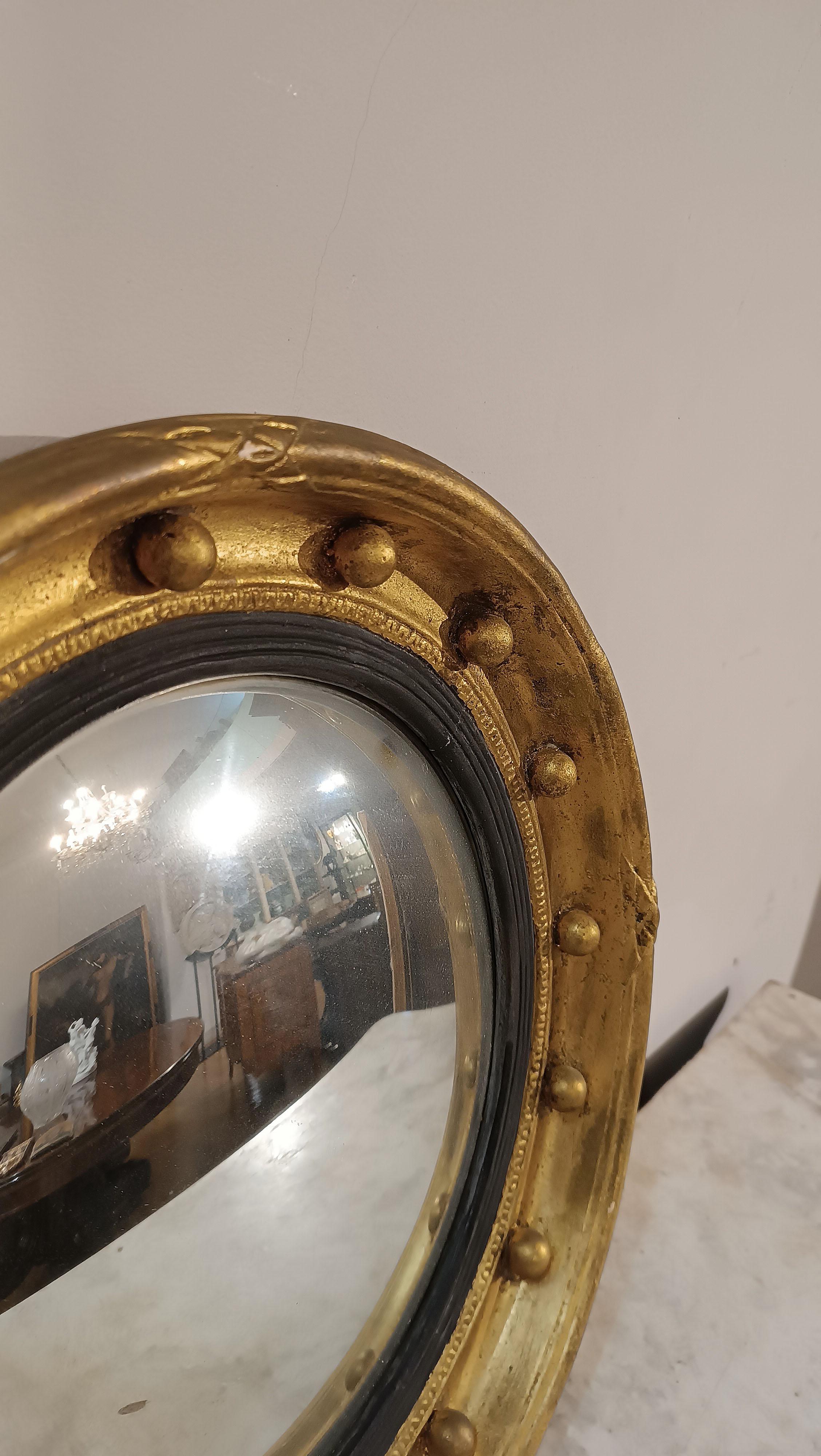 Intagliato a mano FIRST HALF OF THE 19th CENTURY EMPIRE LENS MIRROR in vendita