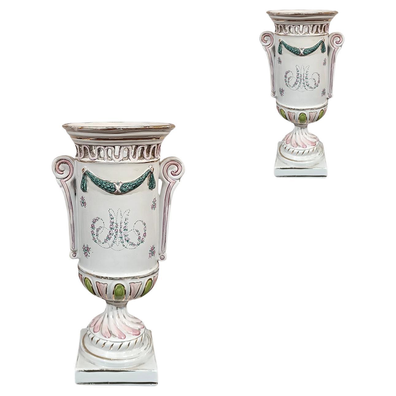 COPPIA DI VASI IN PORCELLANA DIPINTA DELLA PRIMA METÀ DEL XIX SECOLO