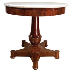 FIRST HALF OF THE 19th CENTURY ROUND TABLE IN WALNUT