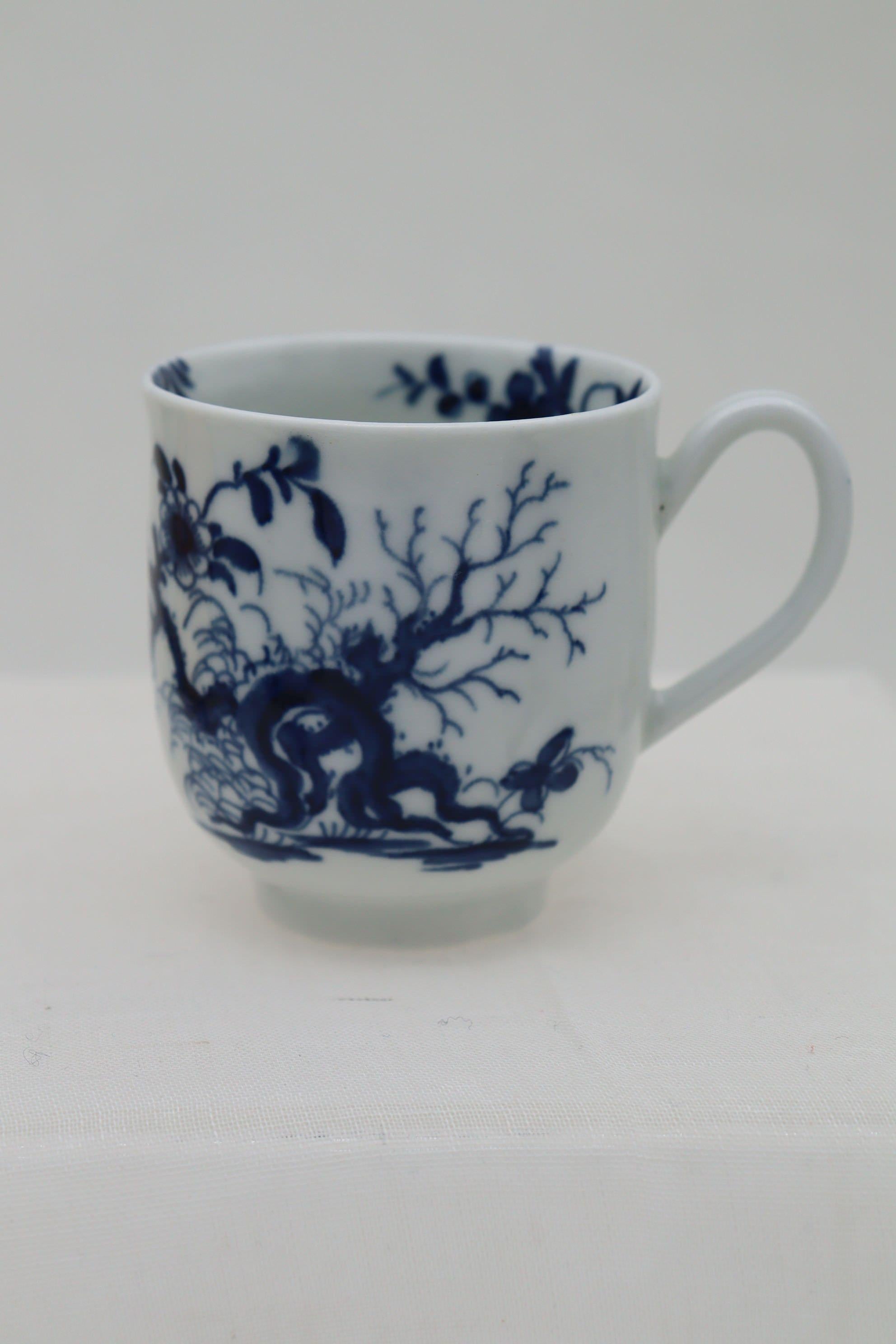 This First period Worcester porcelain coffee cup is decorated with the hand painted blue and white 