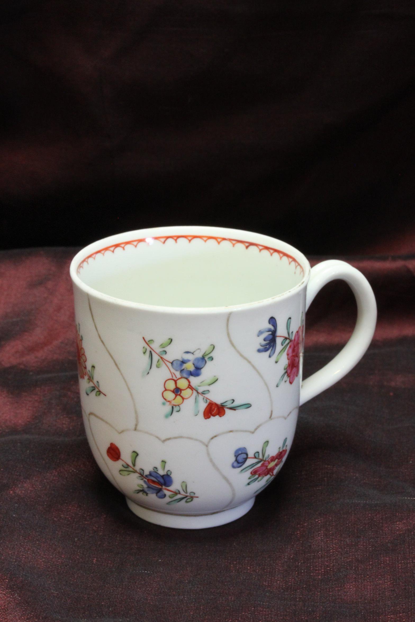 This Worcester porcelain coffee cup was originally decorated with what is known as the 'Gold Queen's Pattern