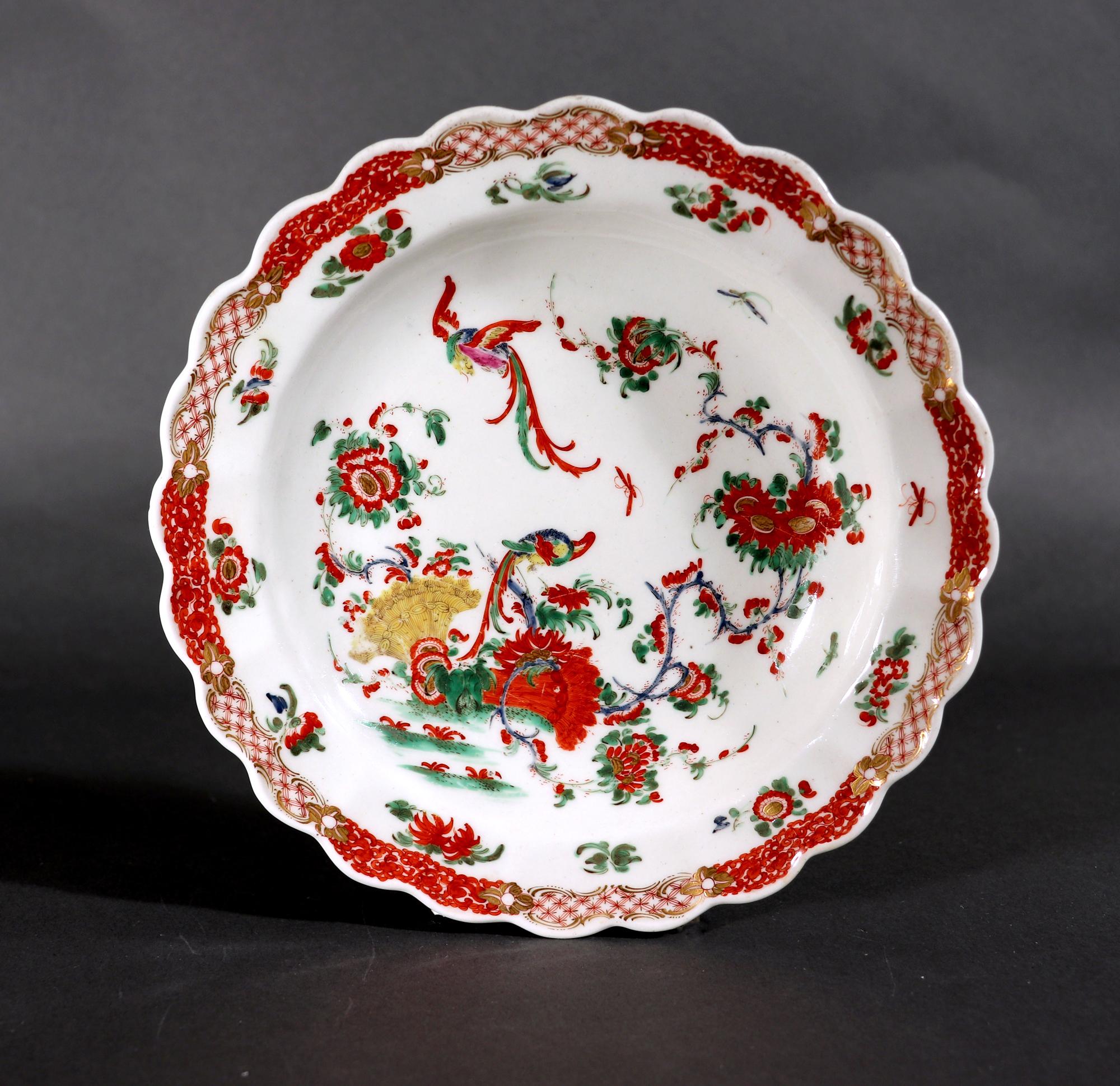 First Period Worcester Porcelain Phoenix Pattern Dessert Plate, 
Circa 1770

The First Period Worcester Porcelain Japan pattern colored dessert plate is painted in the Kakiemon-style colors with two phoenix type birds, one flying above, with
