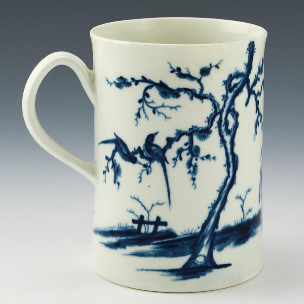 Heading : A Worcester porcelain mug 
Date : circa 1765
Period : George III
Marks :Underglaze blue open crescent
Origin : Worcester, England.
Color Blue on White: 
Pattern : 'Walk in the Garden' chinoiserie hand painted Lady and Boy attendant