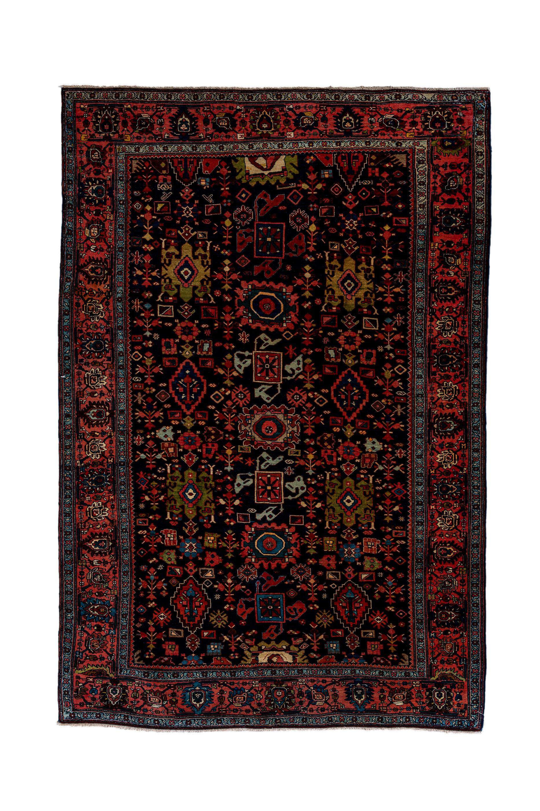 This incredibly robust Kurdish scatter show a near black navy field with a version of the traditional Harshang design, around a central ragged and layered palmettes, and with stepped lozenges and rusty-gold ragged palmettes. Main border with