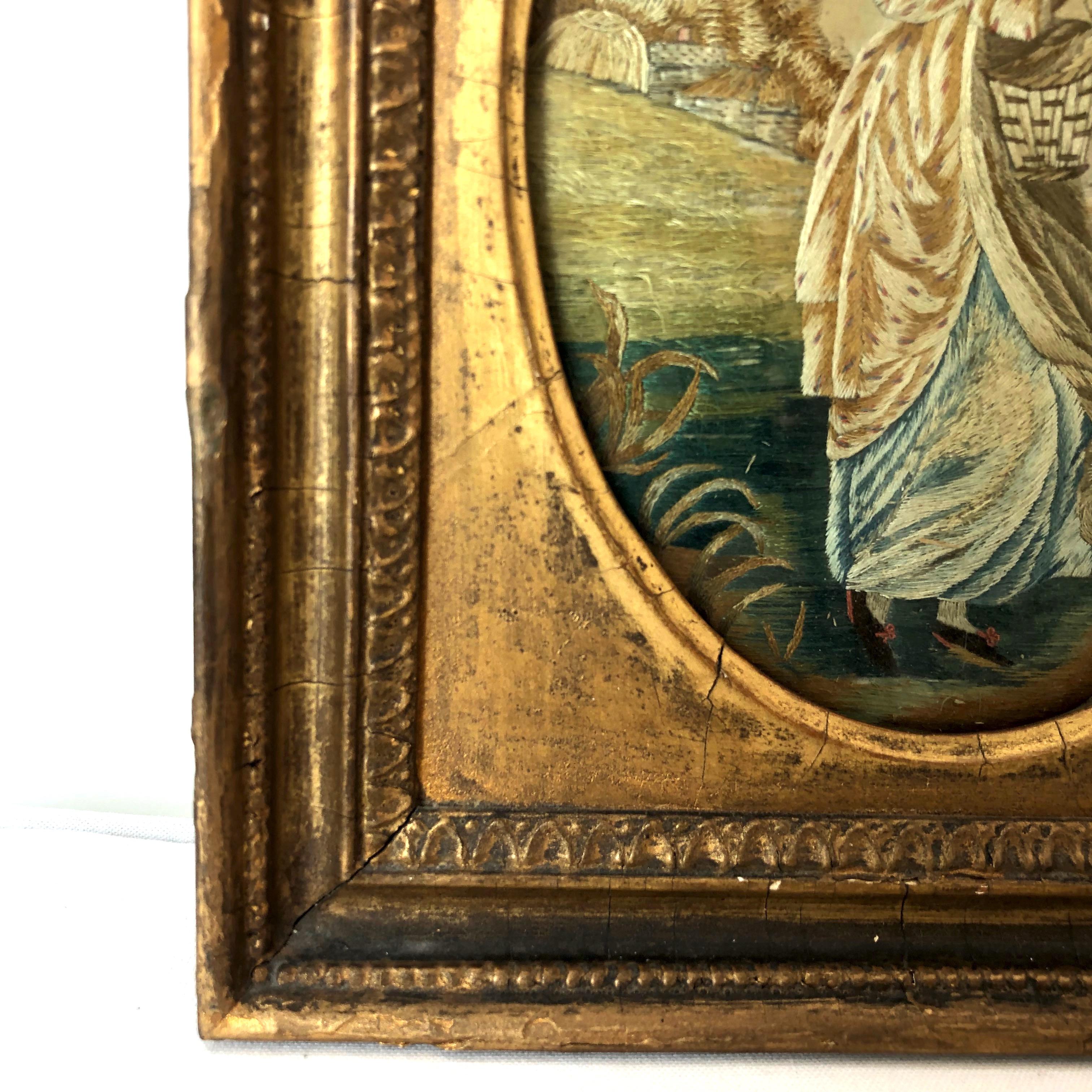 First quarter of the 19th century oval antique framed silk embroidery of woman with rake,
circa 1800-1820. Original frame.