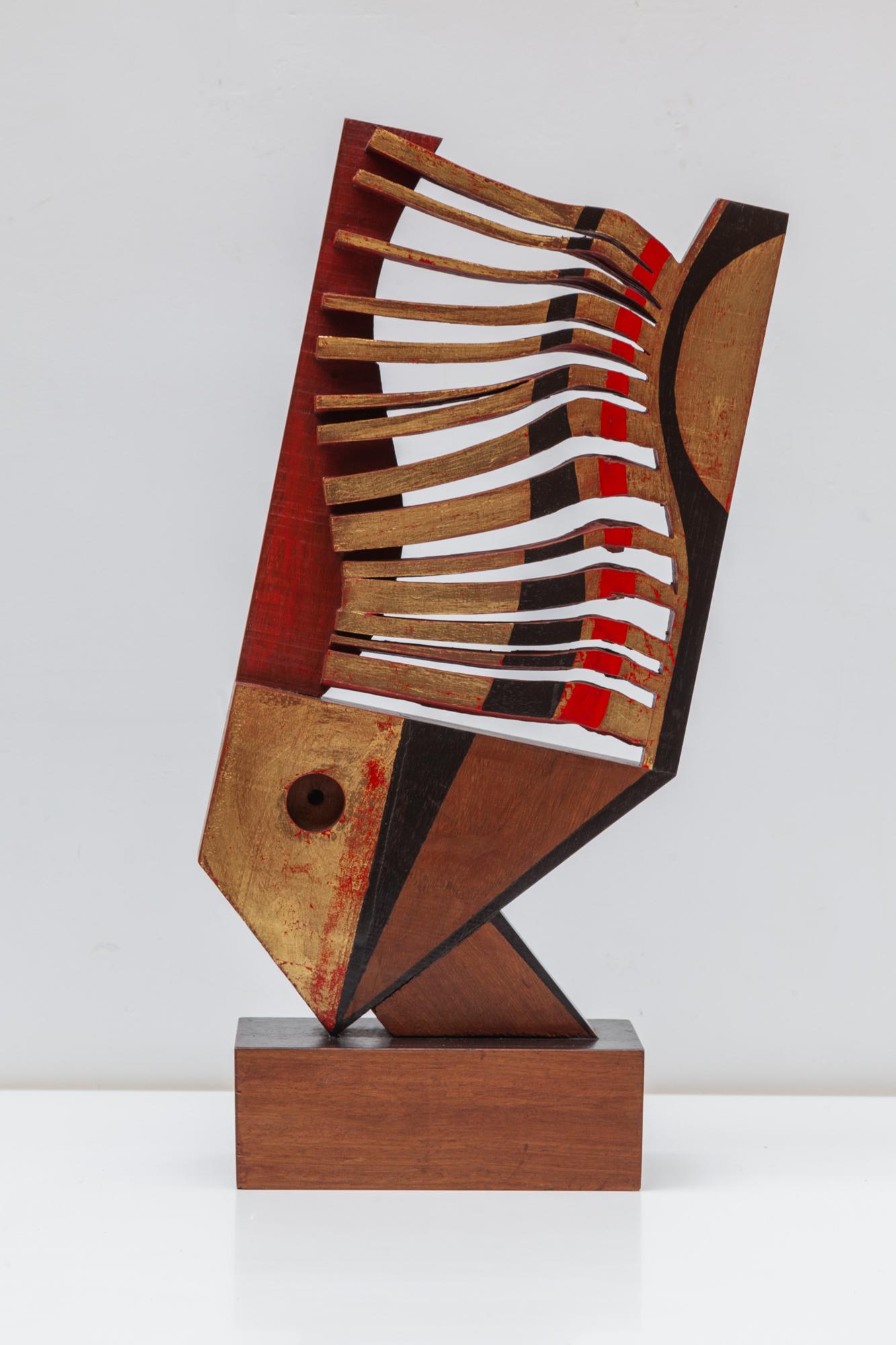 Wooden Fisch sculpture by the Artist Jhan Paulussen, Belgium, 1960s. Signed JH. Modernist dynamic wave design in red, black and gold.

Dimension: 27 W x 60 H x 12 D cm.