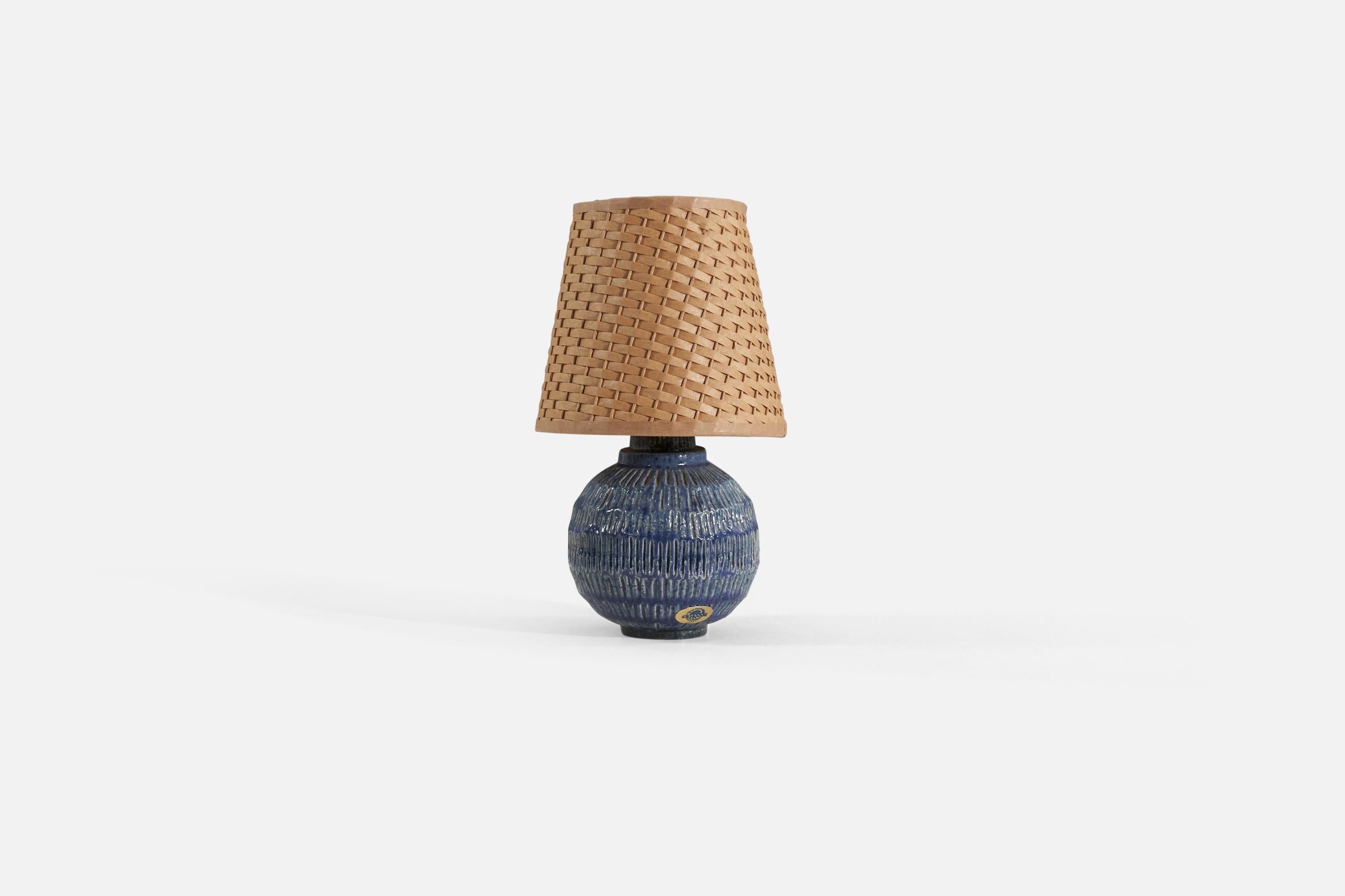 A blue-glazed stoneware table lamp designed and produced by Fischer Stengods, Sweden, c. 1960s

Measurements listed are of lamp.
Shade : 4.25 x 6.25 x 6
Lamp with shade : 10.25 x 6.25 x 6.25.