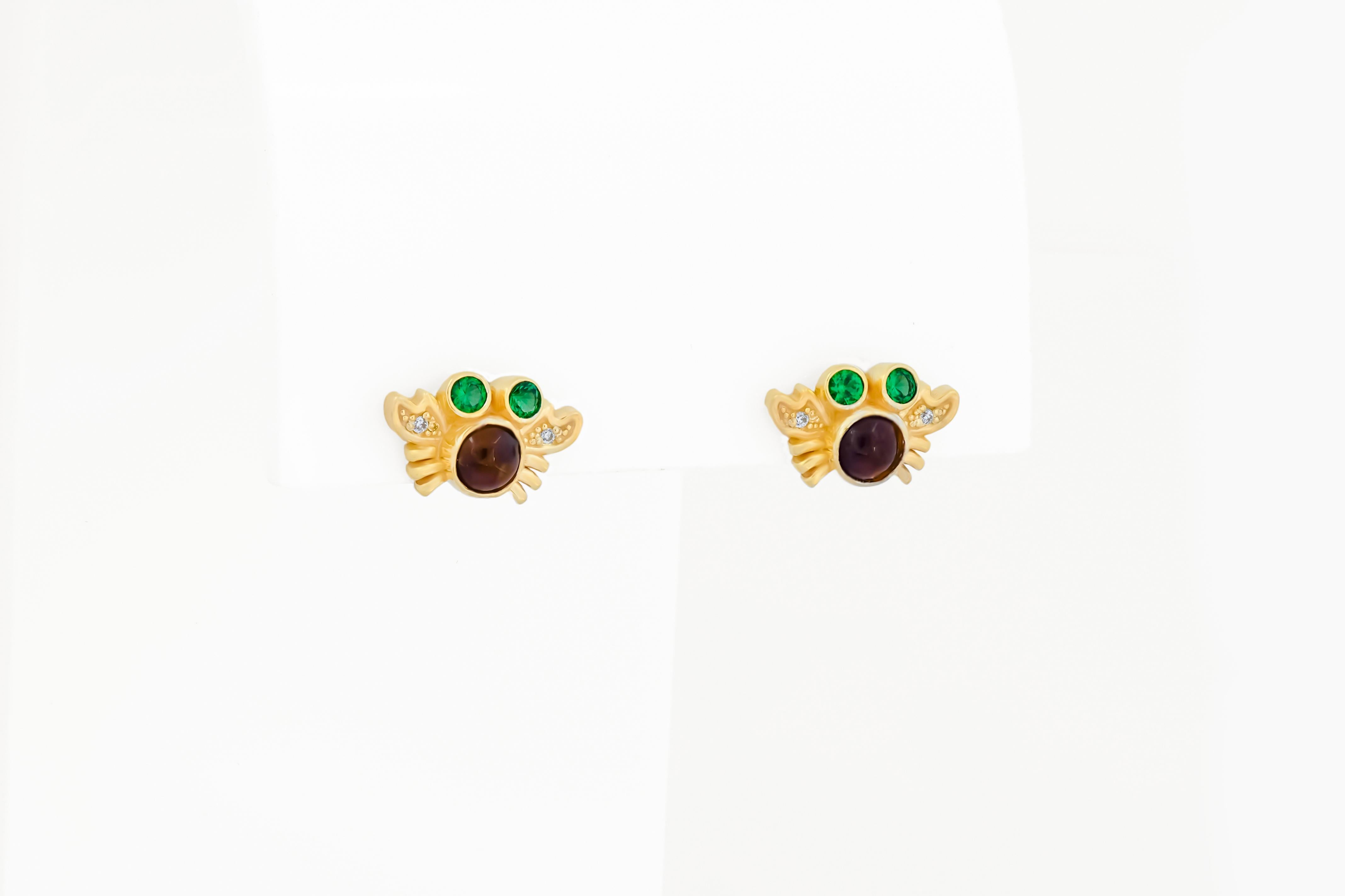 Fish, flower and crab earrings studs. Animal earrings. Silver earrings studs. 

Metal: silver 925 covered 14k gold

Weight: 4.2 gr  
Crab earrings size: 10x8 mm
Fish size: 18x16mm
Flower size: 9x9 mm
Gemstones:
Crab: 2 round garnets orange to brown