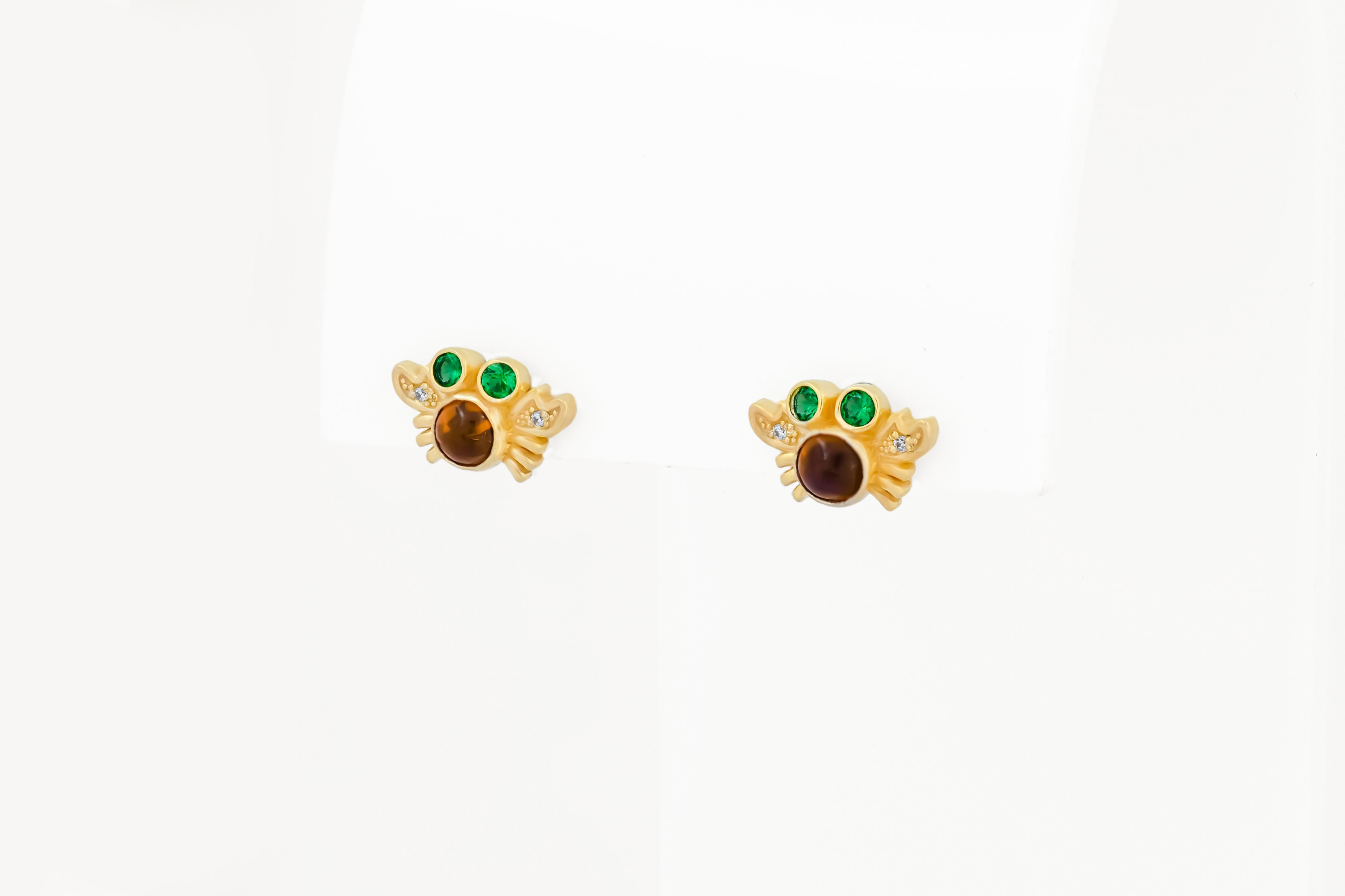 3 pair of earrings studs:  Fish, crab and flower  4