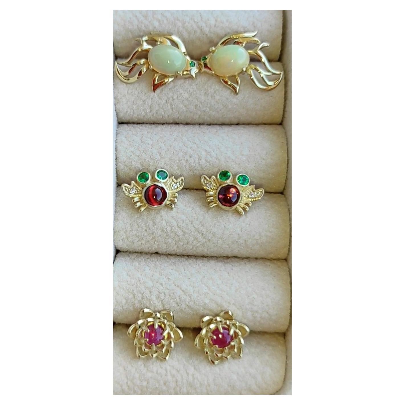 3 pair of earrings studs:  Fish, crab and flower 
