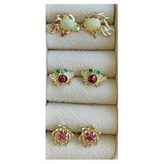 3 pair of earrings studs:  Fish, crab and flower