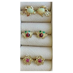 3 pair of earrings studs:  Fish, crab and flower 