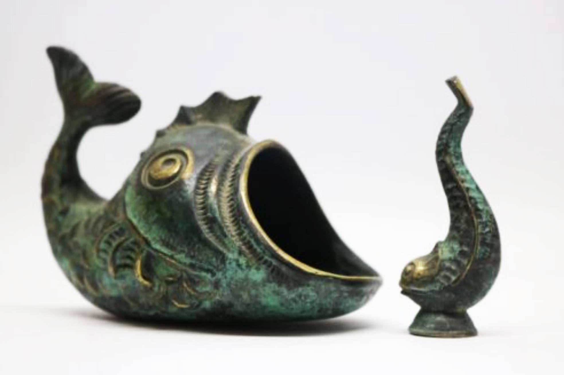 Cast brass blackened by Walter Bosse designed for Hagenauer in the 1950s.
Both in a form of a fish.
Excellent original condition.