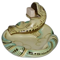 Piatti decorativi e videopoche della modernità di metà secolo