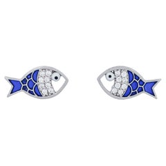 Fish earrings with moissanites and blue enamel in 14k gold.