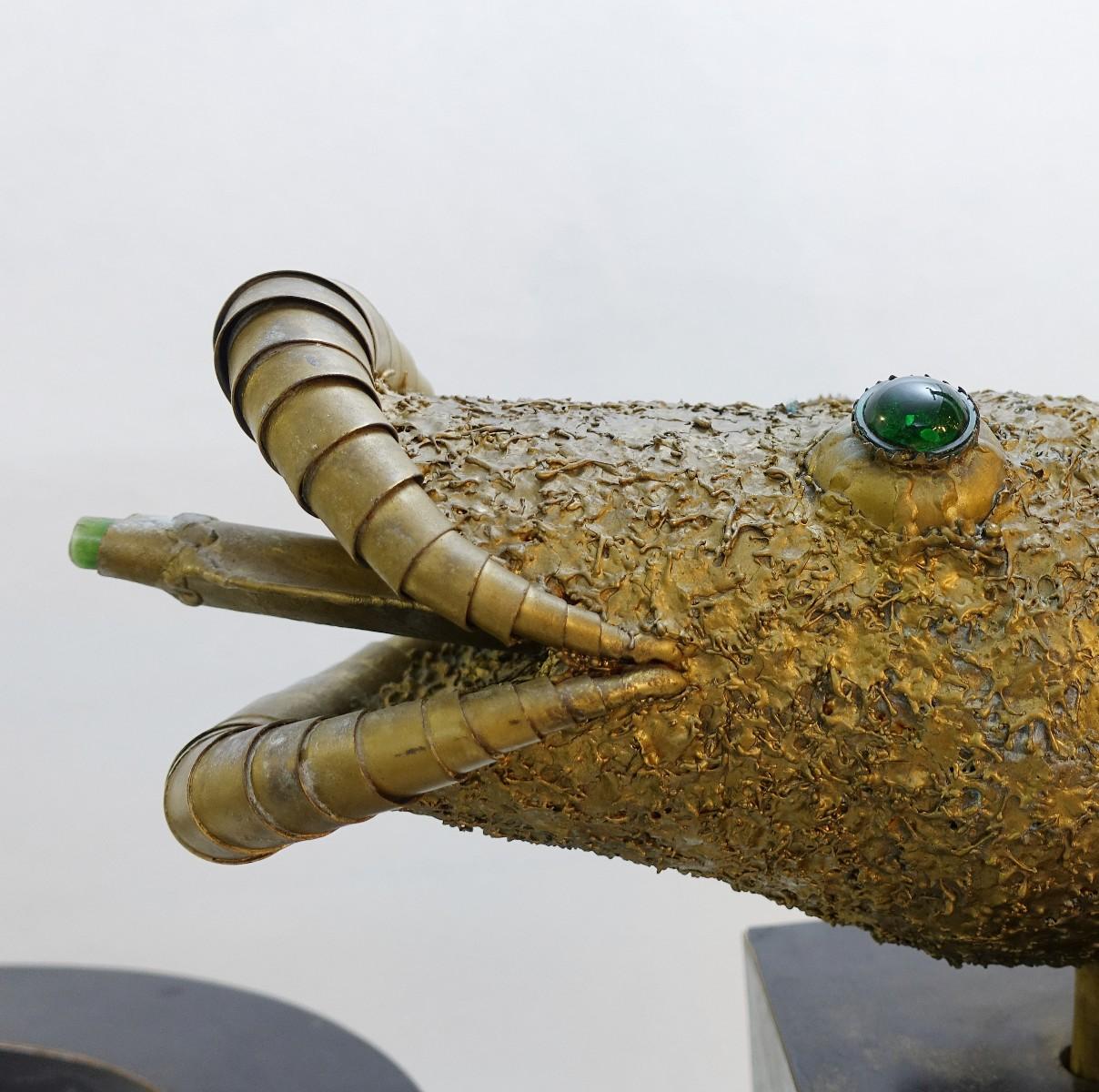 Fish fountain in brass and Lucite, France, 1960s.

Measures: Width fish: 55 cm - container: 74 cm
Height fish: 195 cm - container: 72 cm
Depth fish: 50 cm - container: 74 cm.