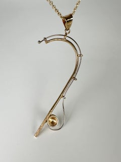 Collier avec pendentif en forme d'hameçon de poisson