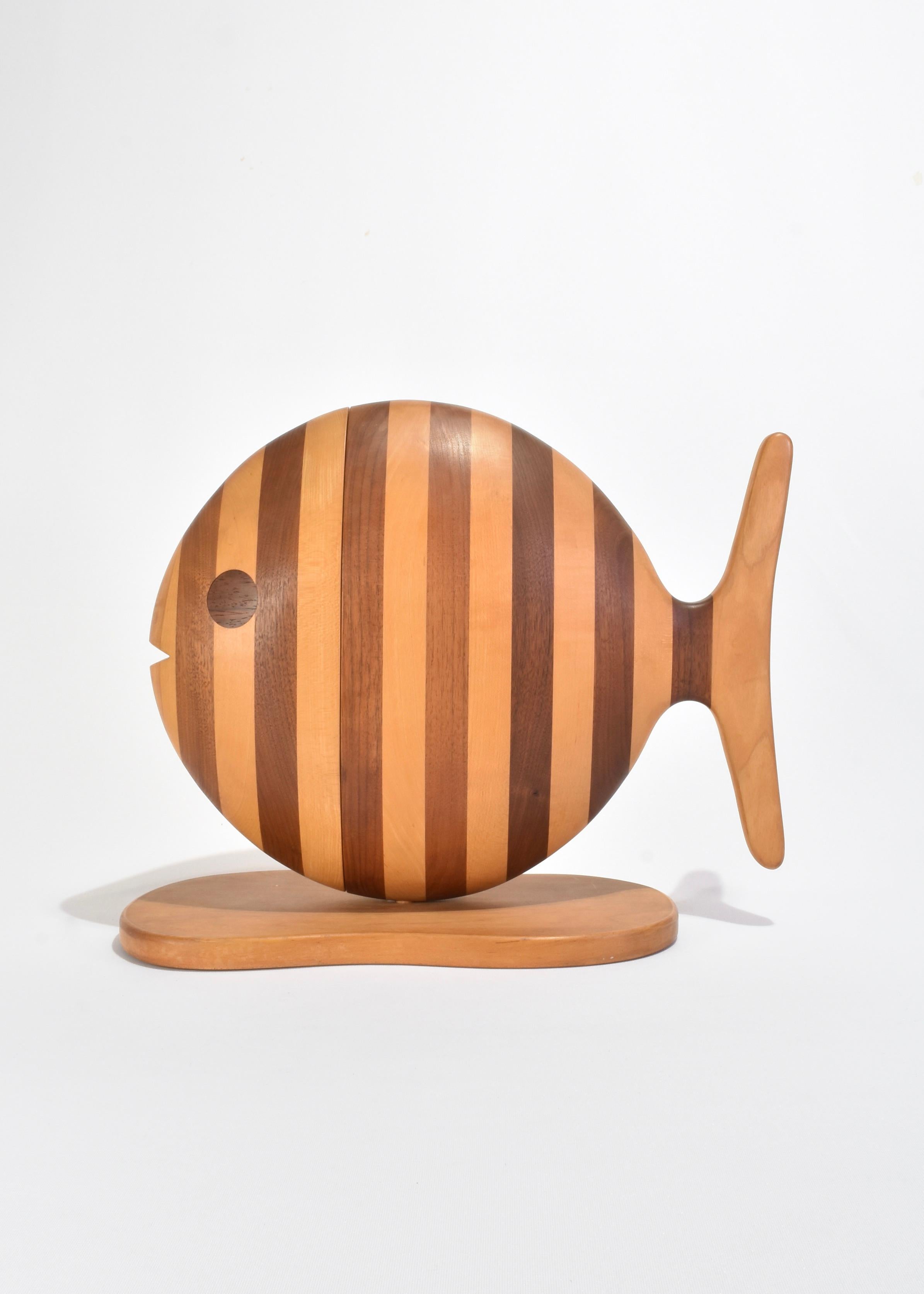 Rare vintage hand-crafted wood jewelry box in the shape of a fish with stripe detail and three sliding drawers. Box has a magnetic closure and removable base. Signed on base, Gene Sherer 1984.