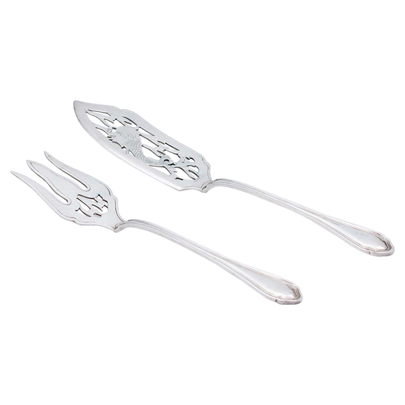 Fish knife and fork in cut and engraved silver, with friezes along the handles