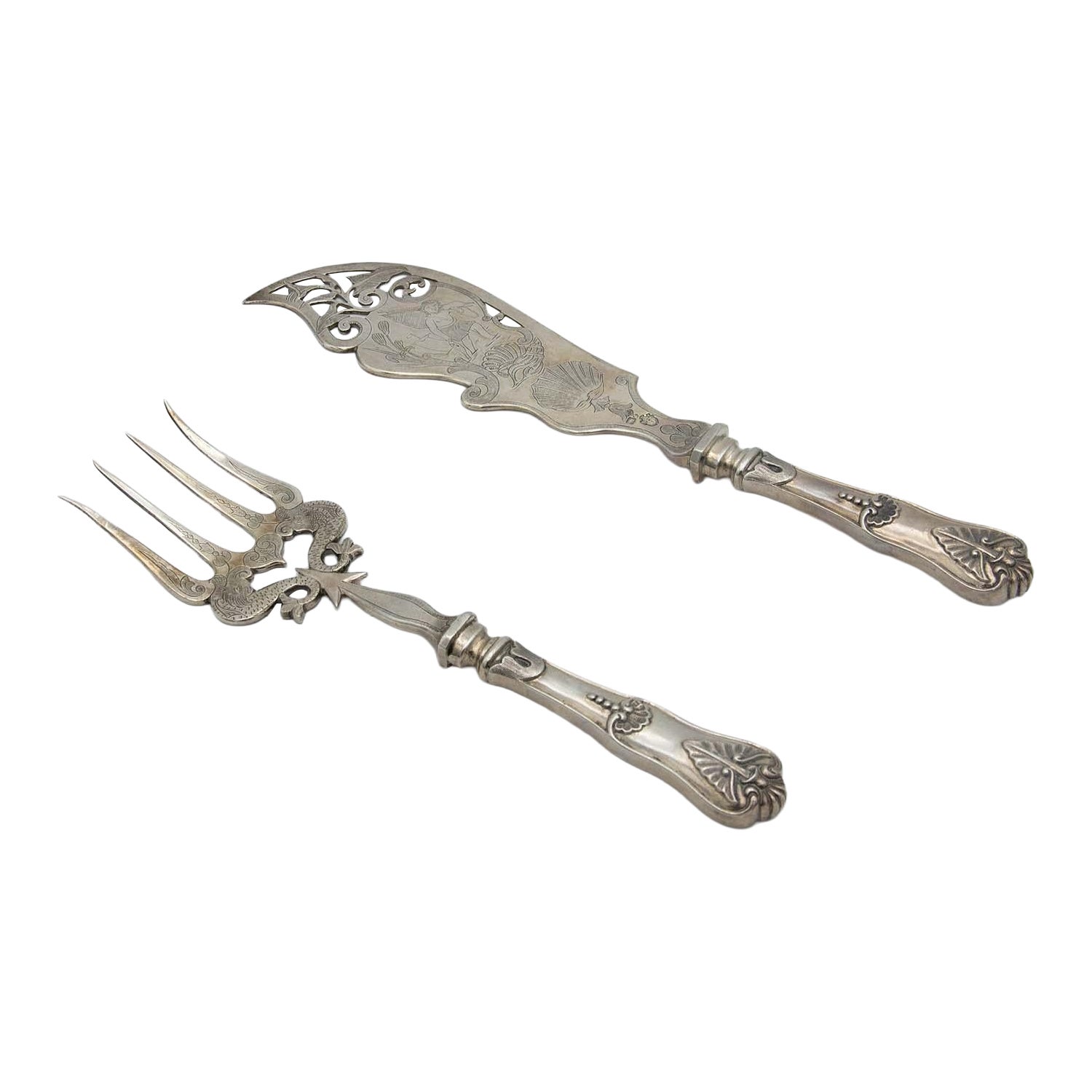 Fish knife and fork with engravings and cutouts