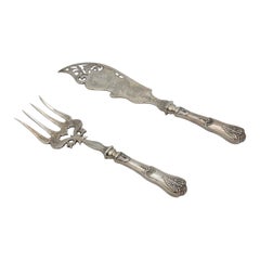 Fish knife and fork with engravings and cutouts
