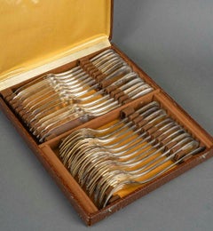 Fish Service with 12 Forks and 12 Fish Knives by the Silversmith Christofle.