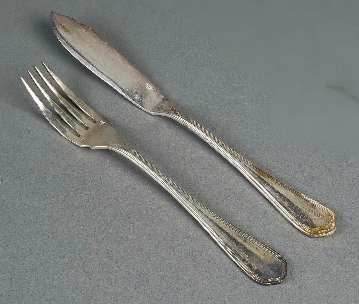 French Fish Service with 12 Forks and 12 Fish Knives by the Silversmith Christofle. For Sale