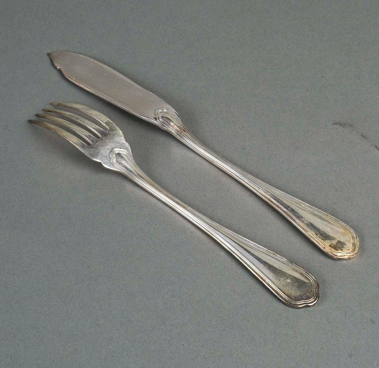 20th Century Fish Service with 12 Forks and 12 Fish Knives by the Silversmith Christofle. For Sale