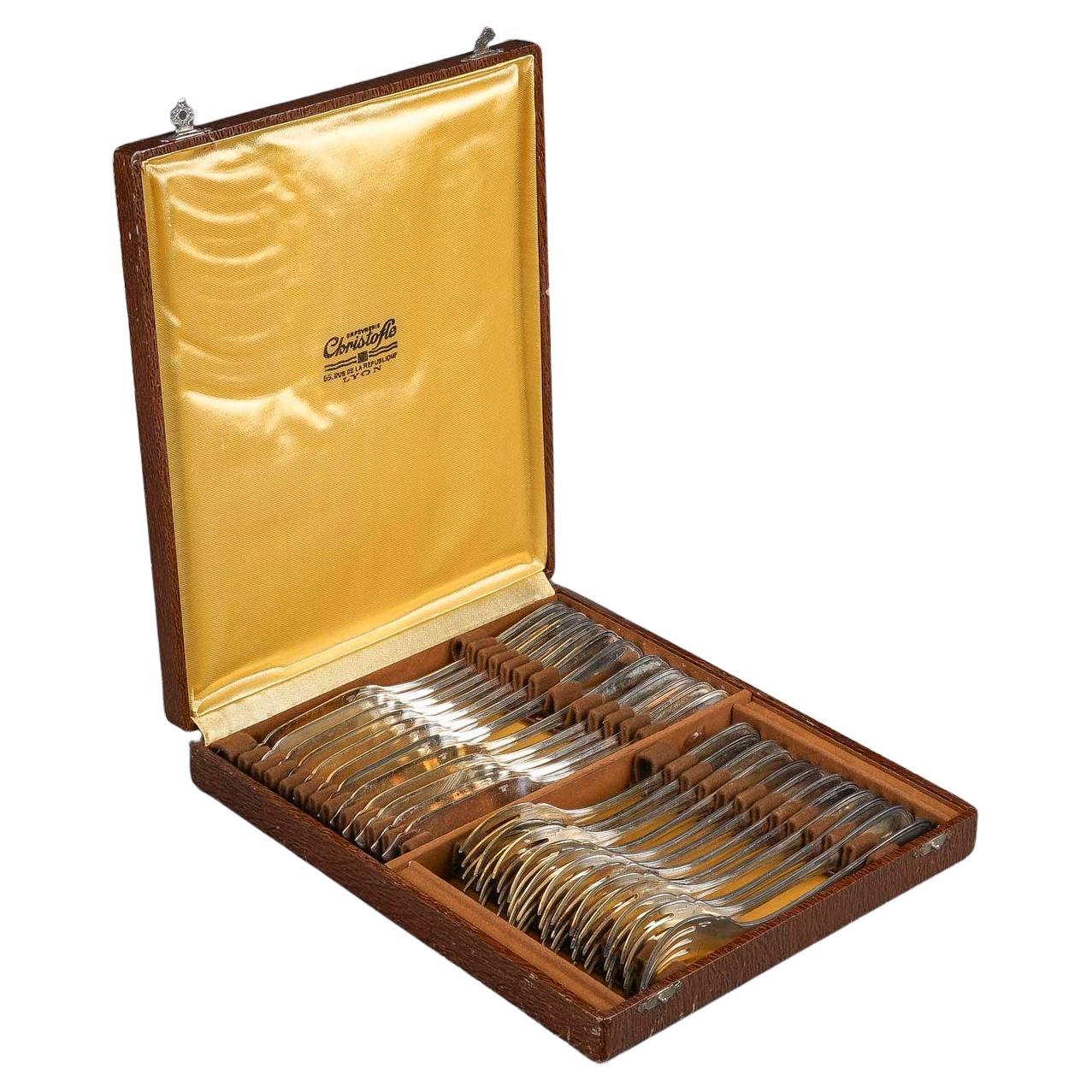 Fish Service with 12 Forks and 12 Fish Knives by the Silversmith Christofle. For Sale