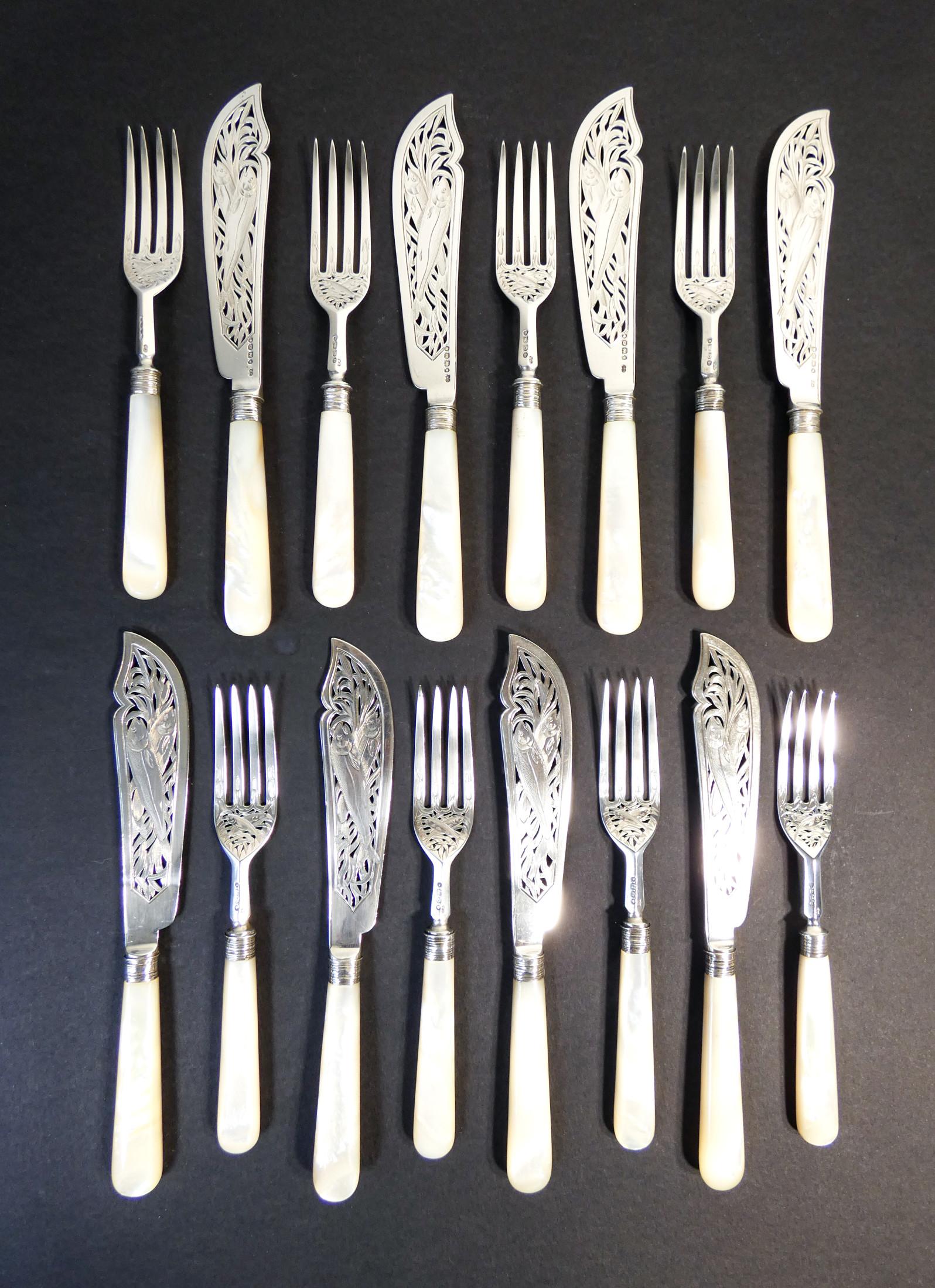 Fish set for eight in sterling silver, mother of pearl handles.
CHAWNER & Co. George William Adams.
London England, 1857-59

Measures: Forks L 19.5 cm
Knives L 23 cm.
