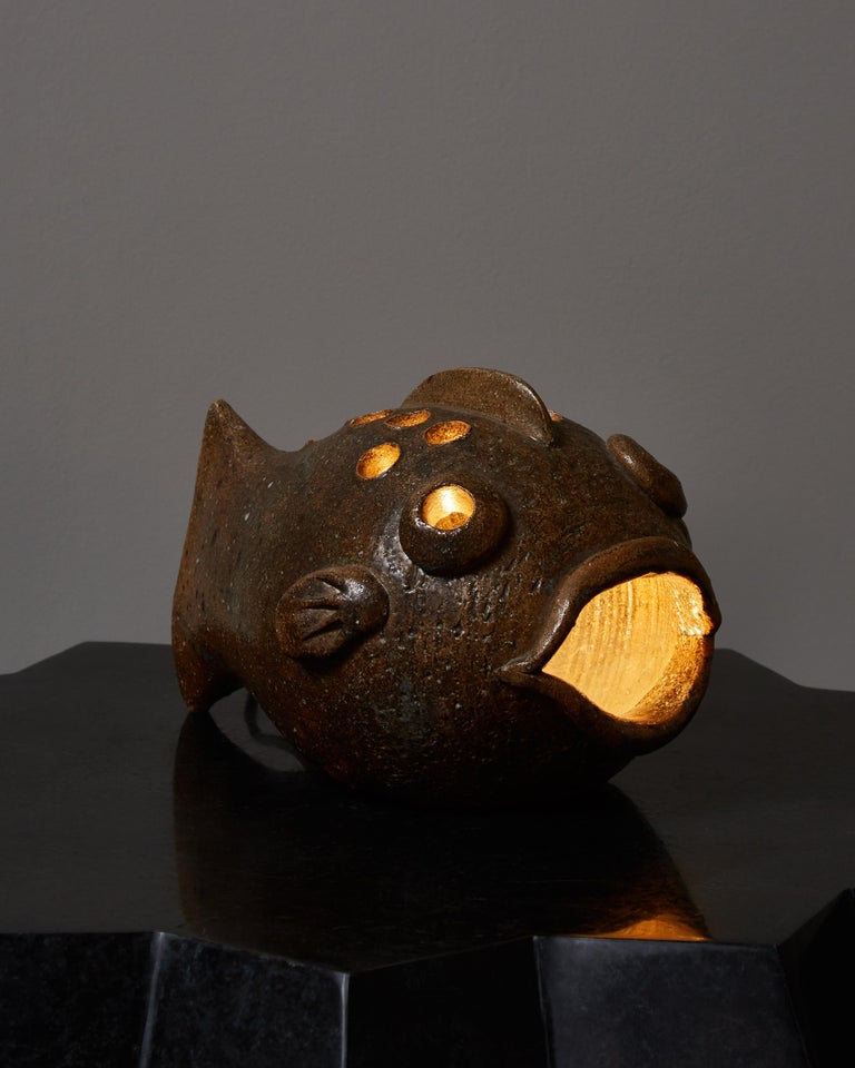 Surprising French Vallauris ceramic table lamp shaped like a fish, with one light bulb inside.
