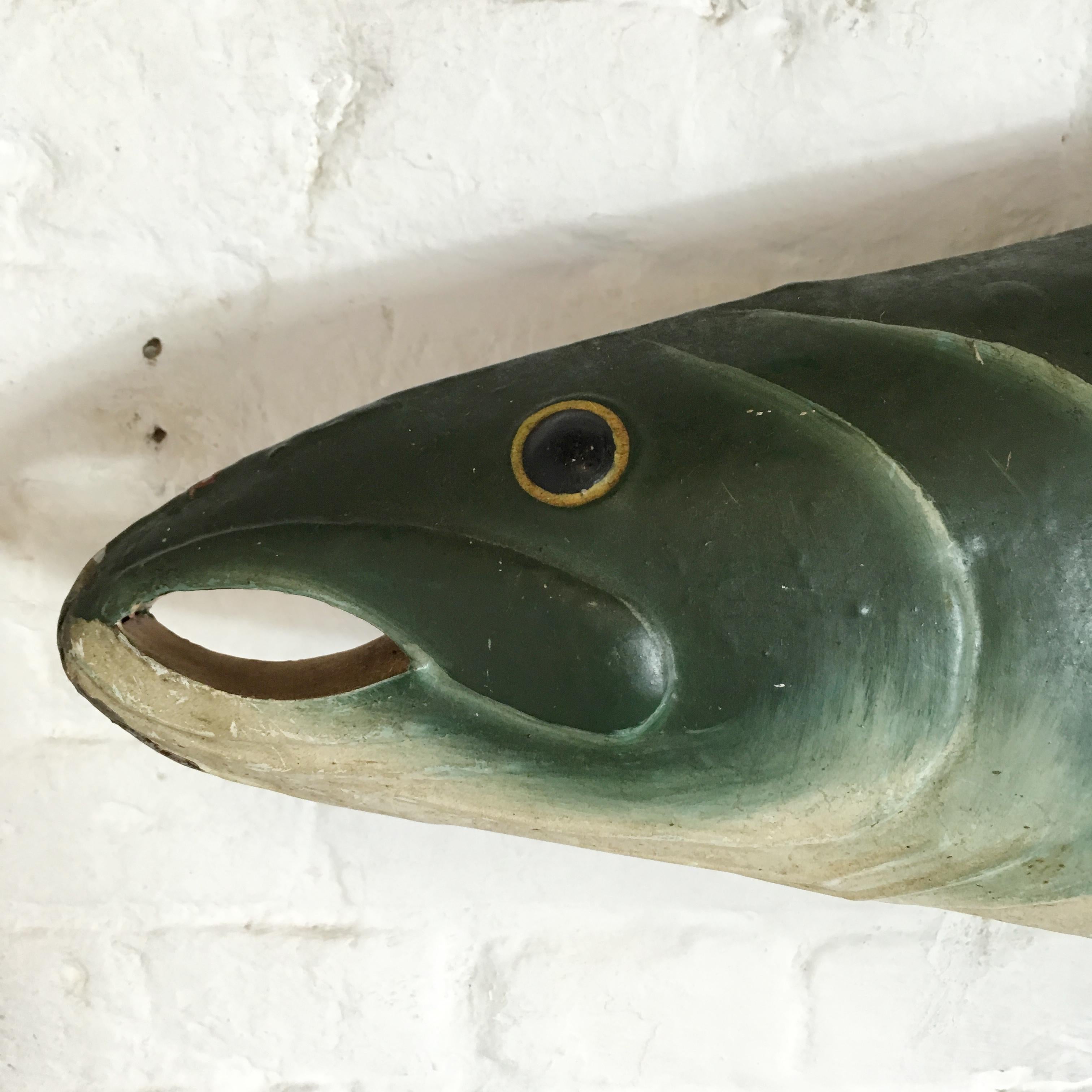 Antique trade advertising sign for a fish / fishing shop
circa 1900's
France
Double sided large metal fish, hand painted same both sides
The fish hangs on a small chain at the top
One of the fins on the fish is missing, this is shown in the