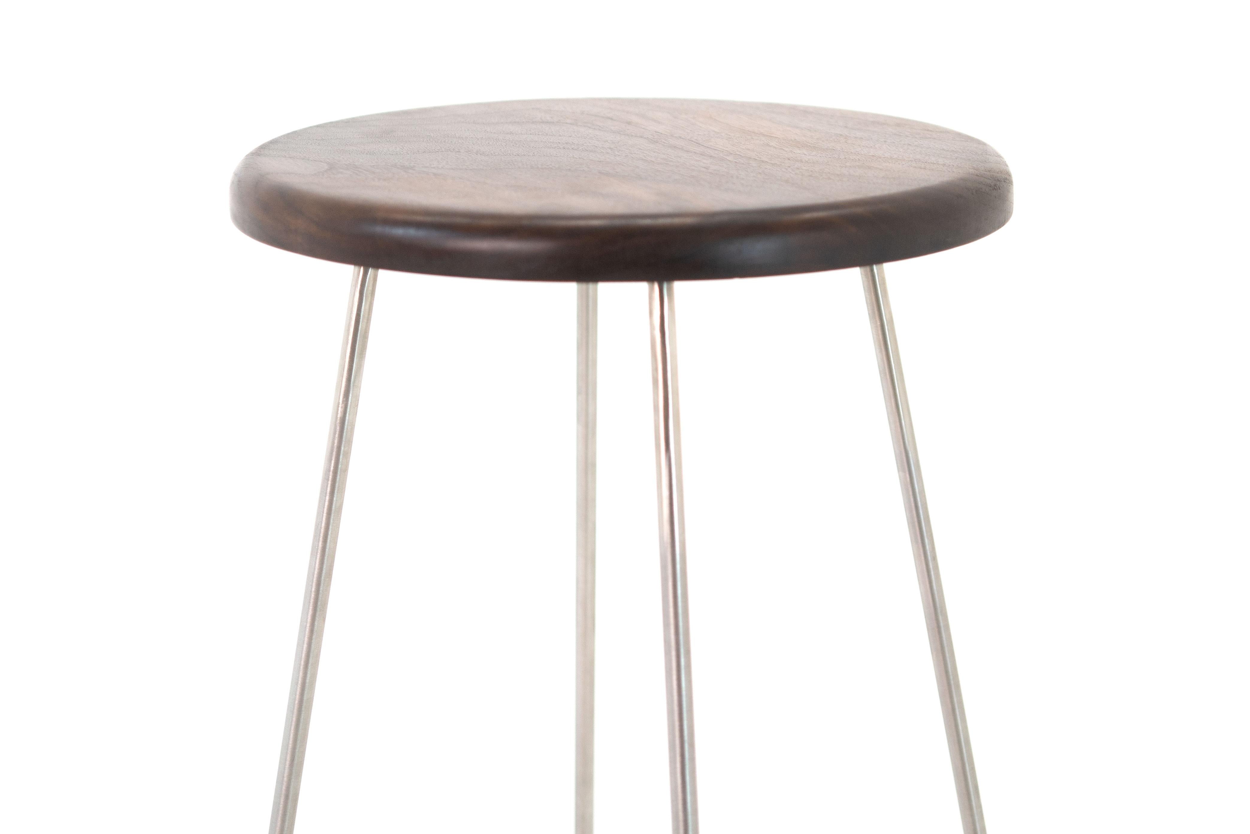 Minimalist Fish Stool Features a Hand Bent Stainless Steel Frame and Solid Wood Seat For Sale