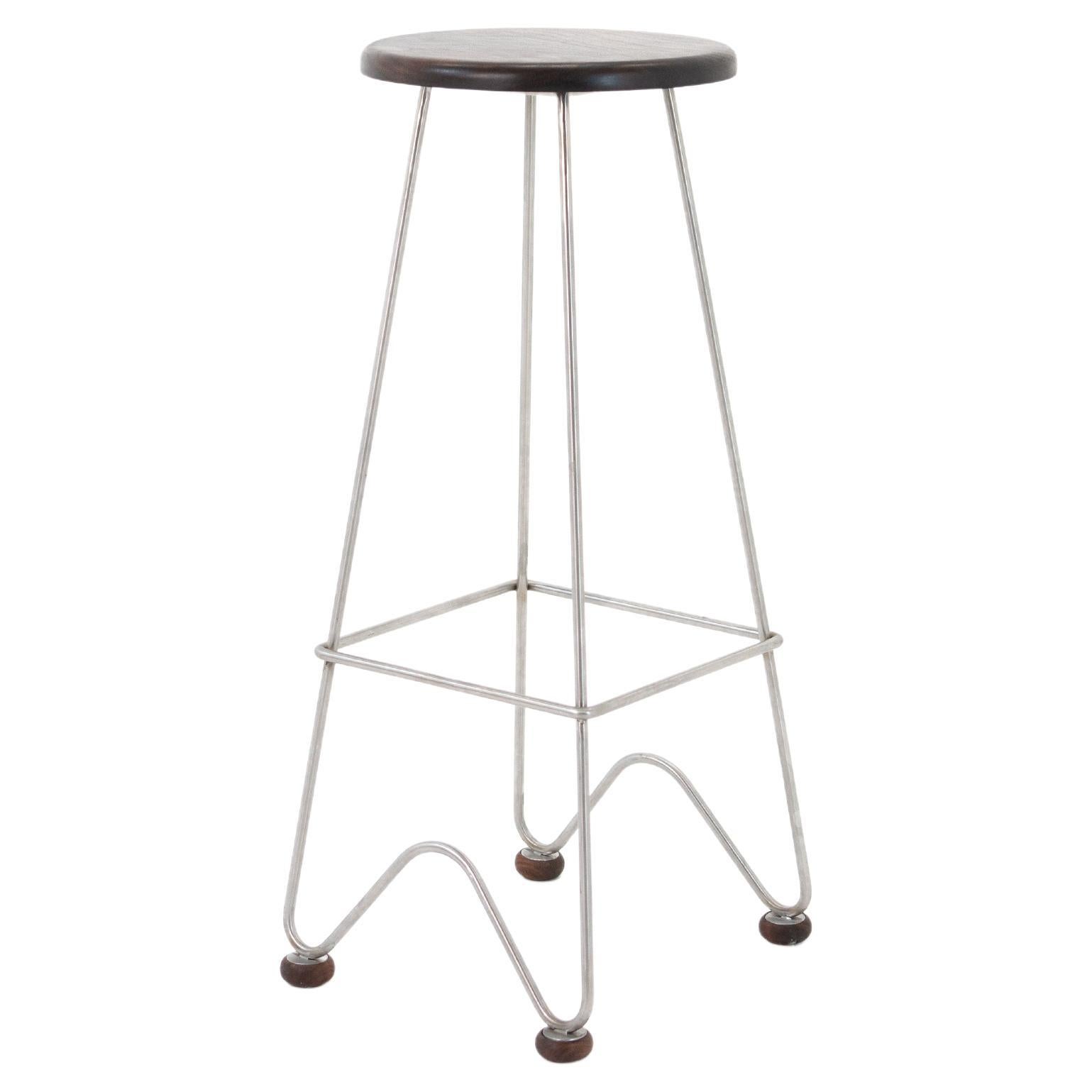 Fish Stool Features a Hand Bent Stainless Steel Frame and Solid Wood Seat For Sale