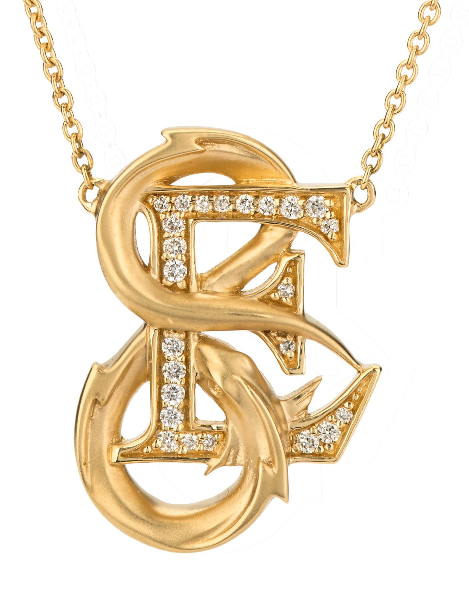 Watch out! There is an electric eel on the loose. Send shockwaves with our ‘E is for Electric Eel’ diamond necklace. Embrace your initials with our Fish Tales collection featuring a matt finish electric eel which surrounds an 18 karat yellow gold