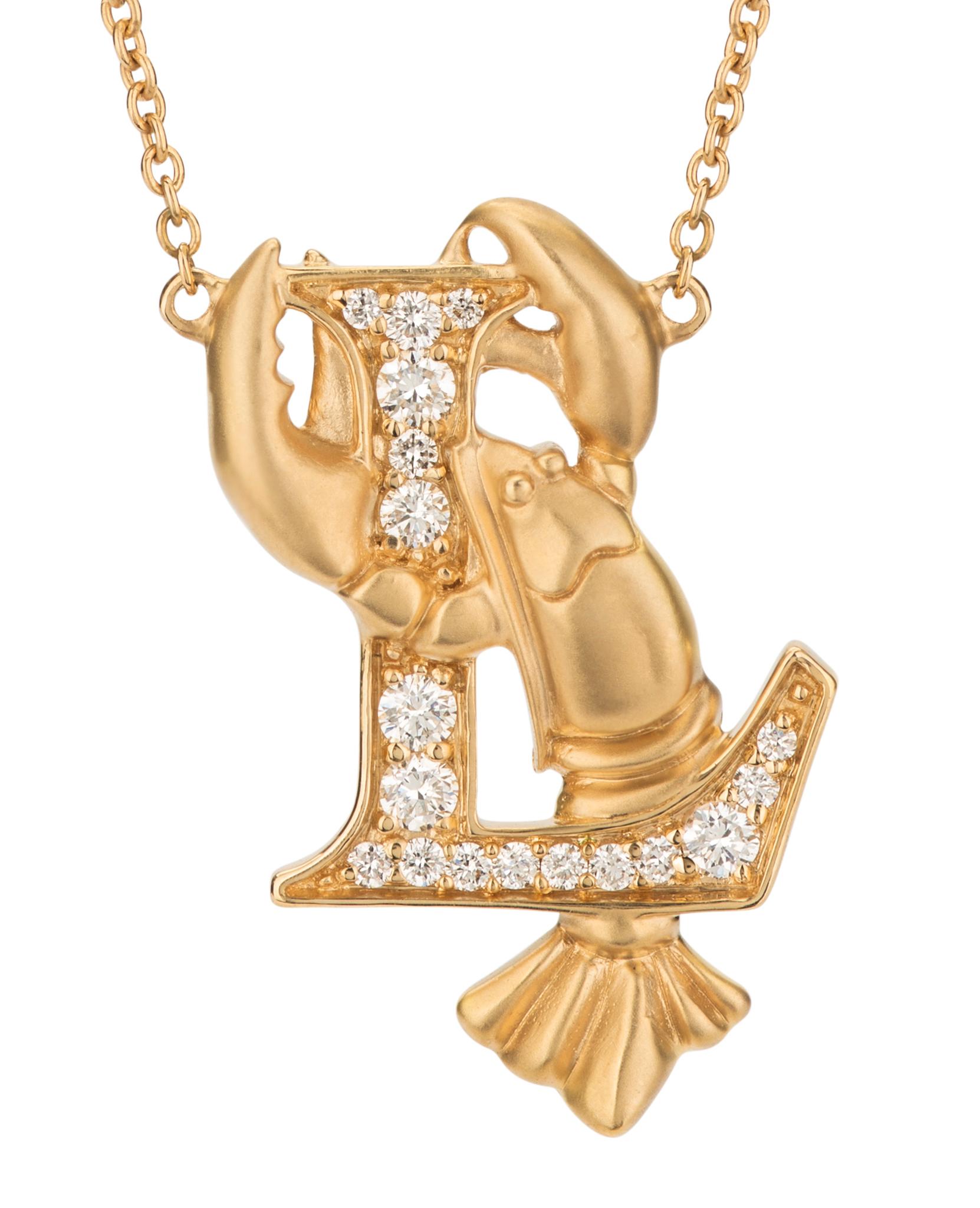 Celebrate your initials with our ‘L is for Lobster’ diamond necklace. Set on a 42cm gold chain this detailed piece boasts an 18-karat yellow gold matt finish lobster entwined within a white diamond letter L.

Each necklace is accompanied by Stephen